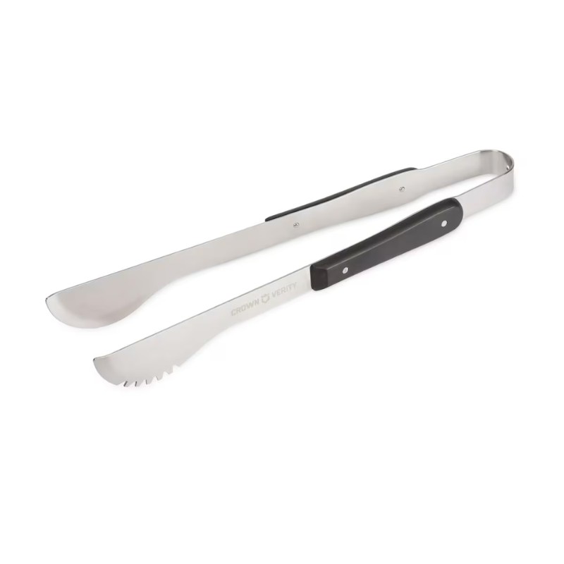 Stainless steel grill tongs with a black handle, featuring a flat spatula end and a serrated edge for versatile grilling and serving.