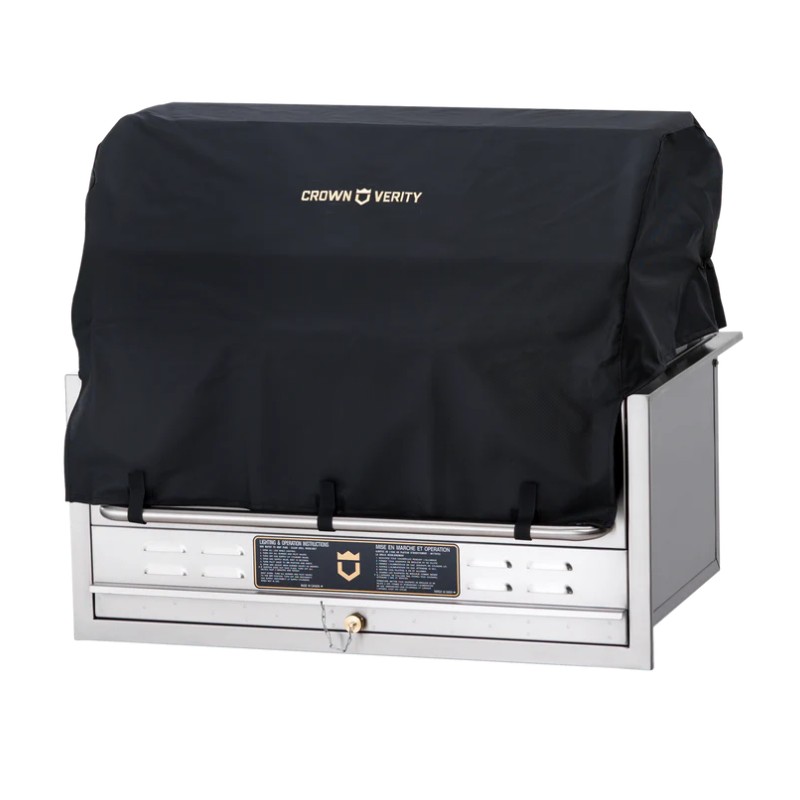 775d8d4d-d7d5-4e3a-806a-7985b1dcc836.jpg Crown Verity stainless steel barbecue grill with protective black cover displayed, showcasing durability and outdoor cooking equipment.