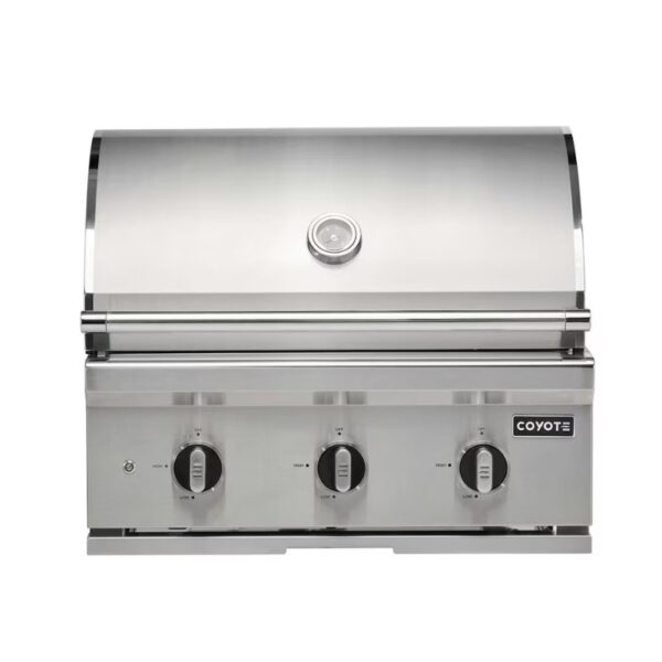 Stainless steel Coyote gas grill with three control knobs and a built-in temperature gauge on the lid.