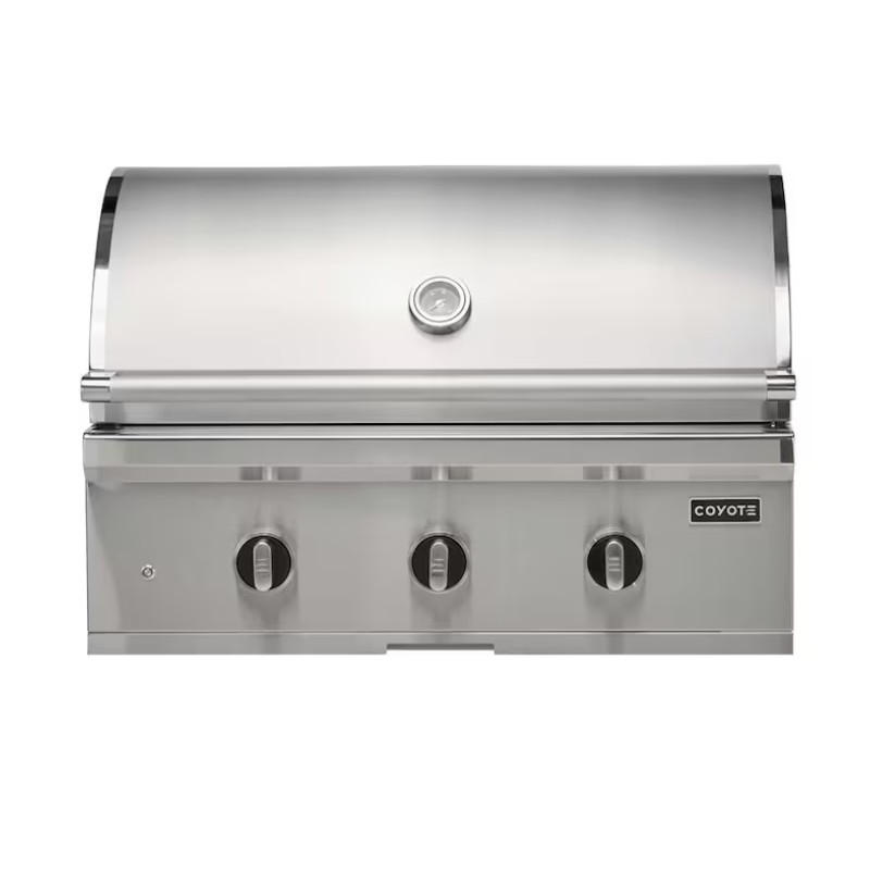 Stainless steel Coyote outdoor gas grill with three control knobs and a lid, designed for efficient grilling.