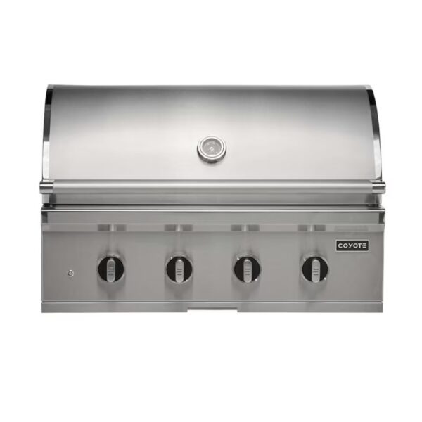 Stainless steel Coyote gas grill with four control knobs and a dome lid, ideal for outdoor cooking.