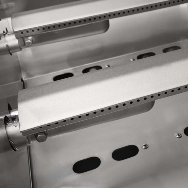Close-up of stainless steel grill burners with perforated surfaces for even heat distribution and cooking efficiency.