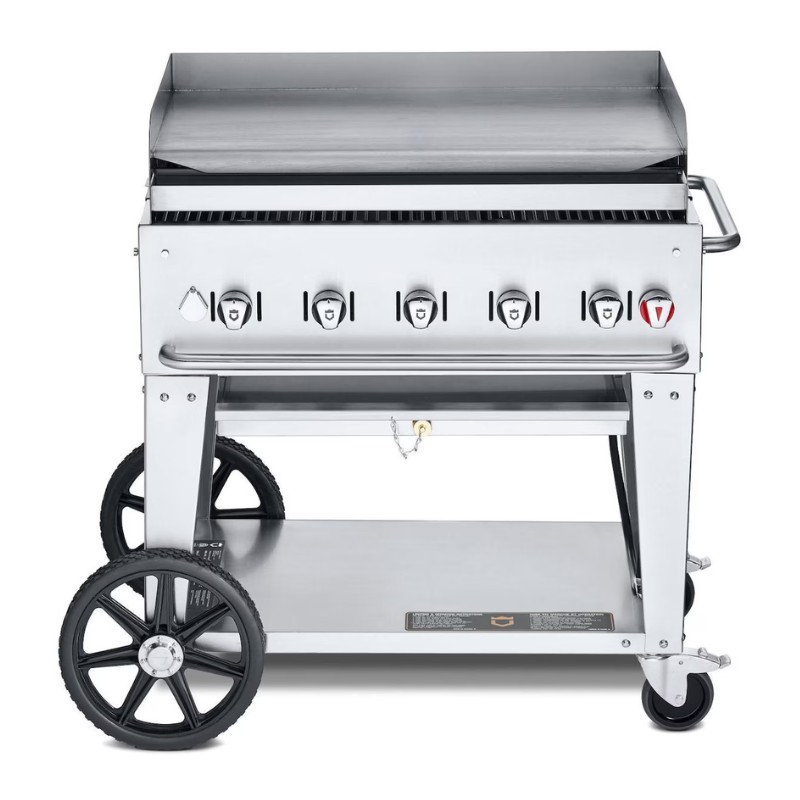c3d20e6d-6426-4471-ad1f-96b7625e10c2.jpg Stainless steel gas griddle with five control knobs, a flat cooking surface, and large wheels for mobility. Ideal for outdoor cooking and grilling.