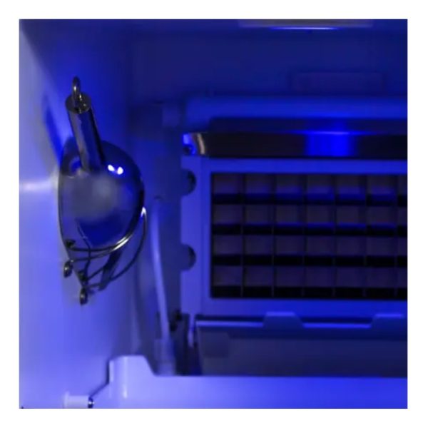 Interior view of a freezer with a metallic scoop hanging on the wall, illuminated by blue light.