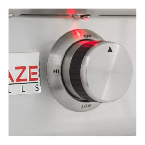 Close-up of a stainless steel control knob for a grill, featuring settings for 'OFF', 'LOW', and 'HI', with a red indicator light.