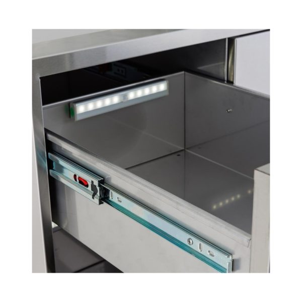 Interior view of a stainless steel drawer with a built-in LED light strip, showcasing a sleek and modern design.