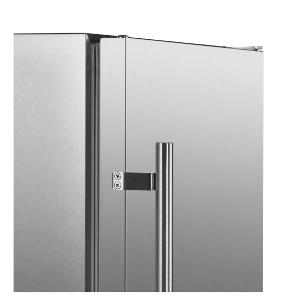 Close-up of a stainless steel refrigerator door with a sleek handle and hinge detail, showcasing modern kitchen design elements.