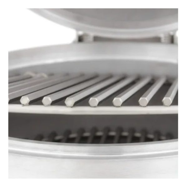 Interior view of a stainless steel cooking appliance with hexagonal rods arranged in rows, designed for grilling or smoking food.