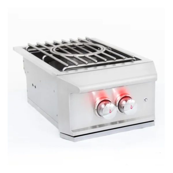 Stainless steel gas grill with two control knobs and a griddle top, featuring illuminated indicators for easy temperature adjustment.