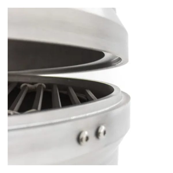 Close-up of a stainless steel grill with an open lid, showcasing the grilling grates inside.
