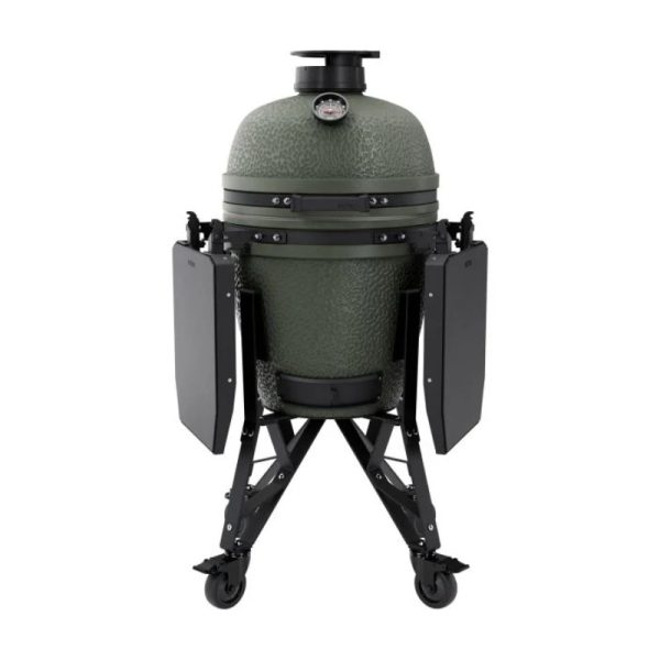 Ceramic kamado grill with a green exterior, mounted on a sturdy black frame with foldable side shelves and wheels for mobility. Ideal for grilling, smoking, and baking.
