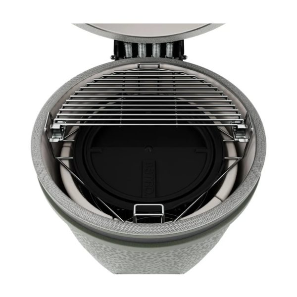 Top view of a portable grill featuring a stainless steel cooking grate and a black charcoal chamber, designed for outdoor cooking and barbecuing.