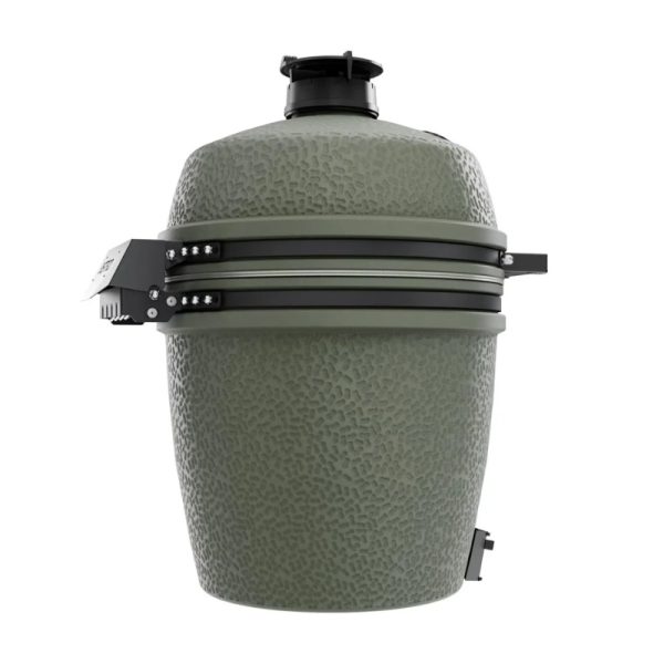 Ceramic kamado grill in green with textured finish and metal accents, designed for versatile cooking and smoking.