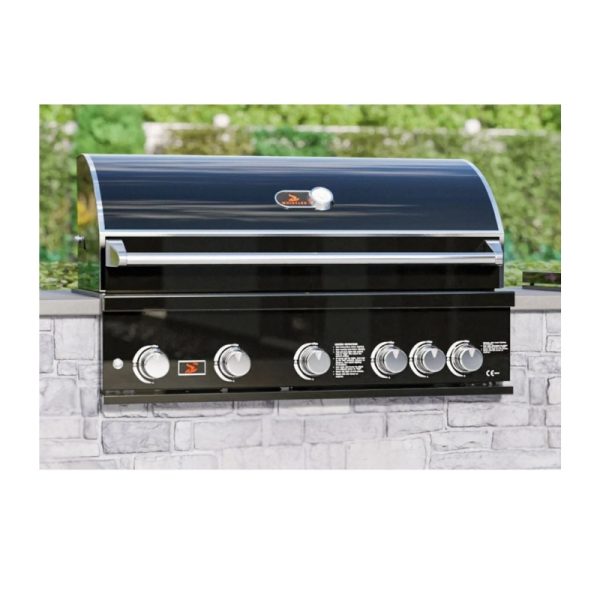 Black outdoor gas grill with multiple control knobs, mounted on a stone wall, ideal for barbecuing and outdoor cooking.