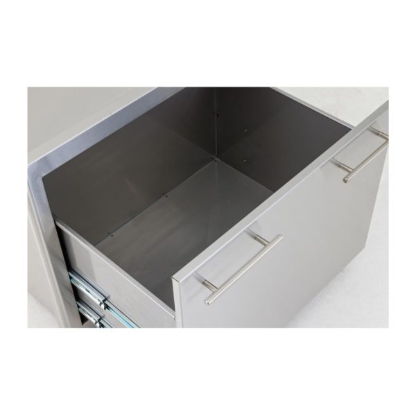 Stainless steel kitchen drawer with modern handles, showcasing a spacious and empty interior.