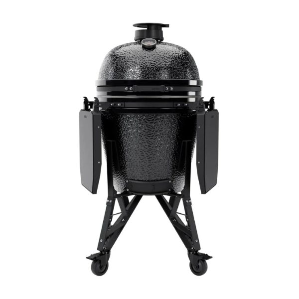 Black ceramic grill with a dome shape, mounted on a wheeled metal frame, featuring side shelves and a built-in temperature gauge. Ideal for outdoor cooking and barbecuing.