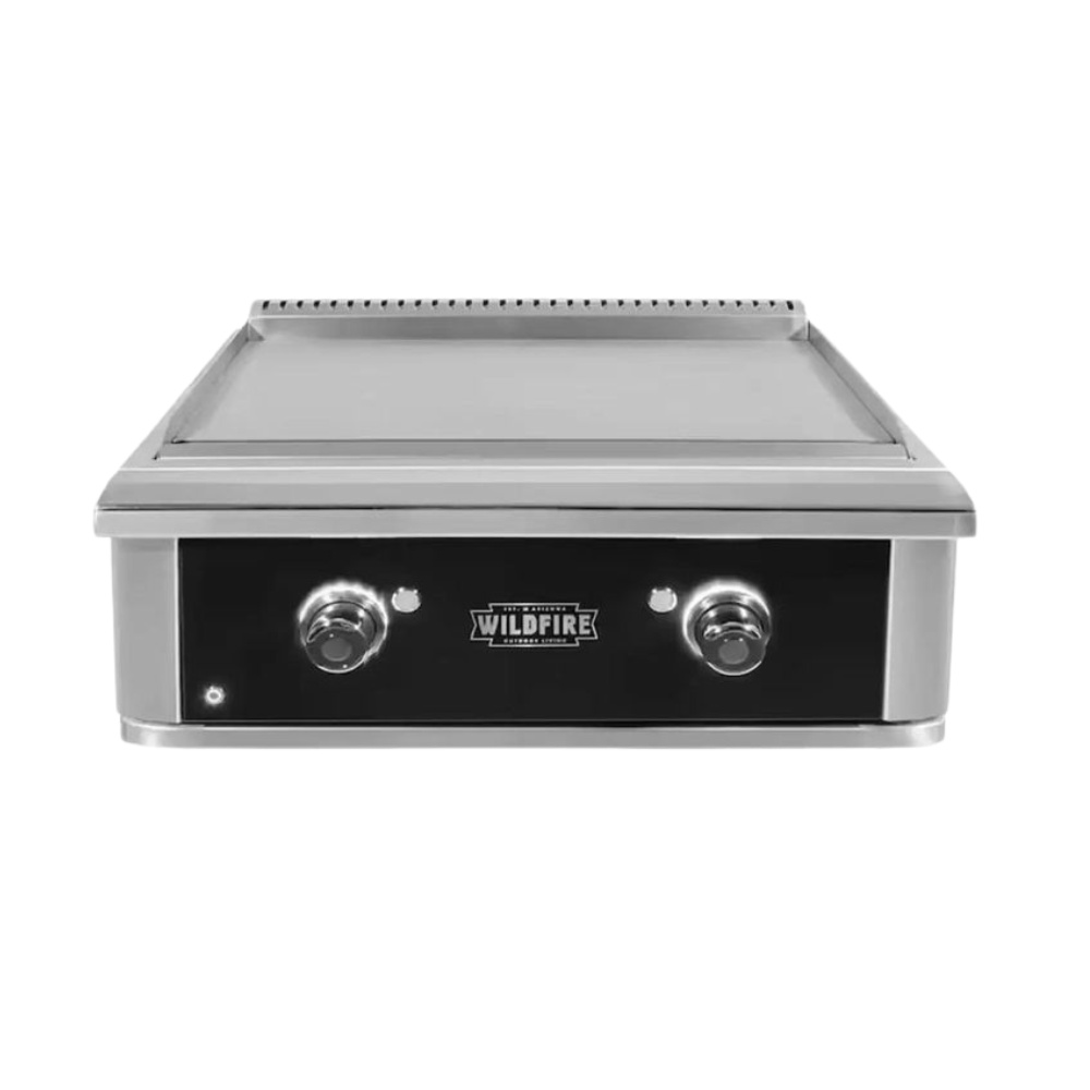 131576a6-da1d-4e89-8896-5b1183ba54c1.jpg Stainless steel griddle with two control knobs, featuring a smooth cooking surface and a prominent Wildfire logo. Ideal for outdoor cooking and grilling.