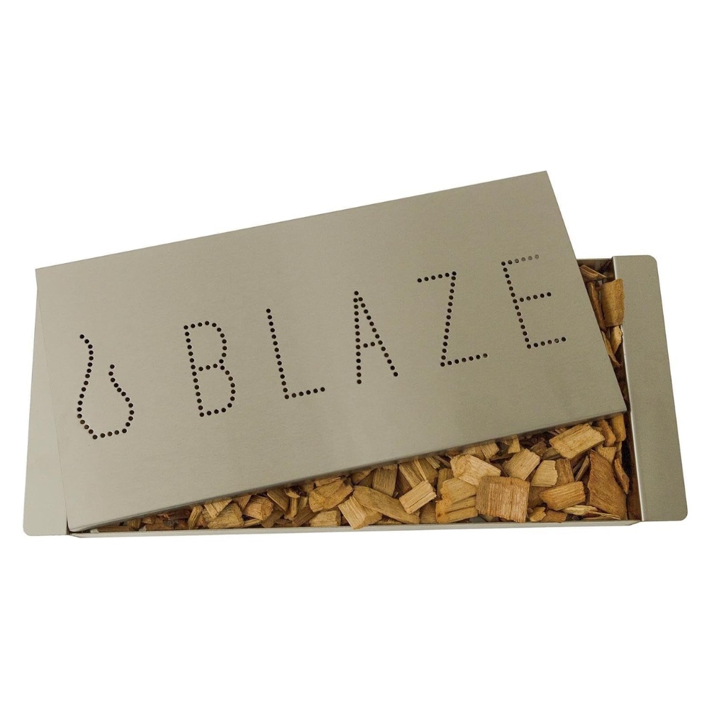 c02cc0b9-c797-47b0-9442-430e86c09e9a.jpg Stainless steel smoker box with wood chips, featuring the word "BLAZE" cut out for ventilation.
