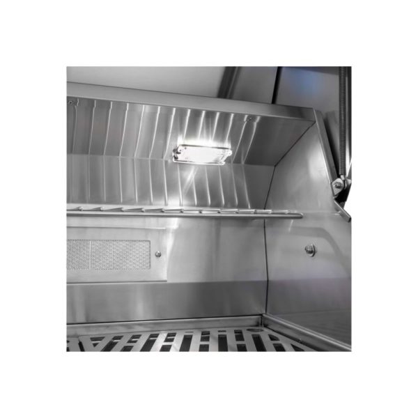 Stainless steel grill interior with a built-in light and a slatted cooking surface, designed for optimal heat distribution and easy cleaning.
