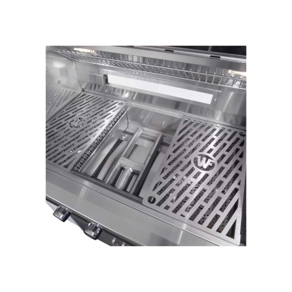Stainless steel grill interior featuring two cooking grates and a built-in light for enhanced visibility.